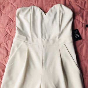 White jumpsuit with pockets